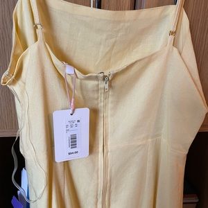 A yellow short mini dress